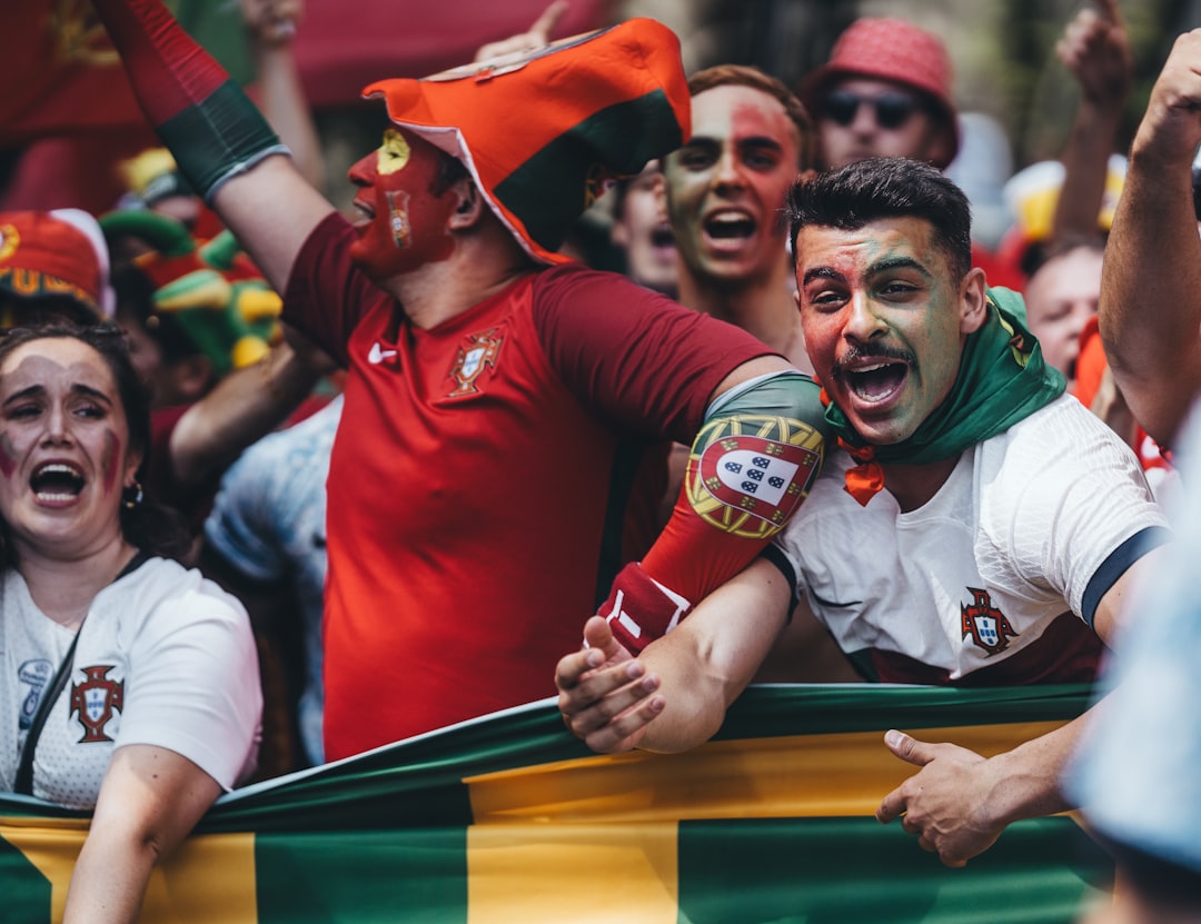 A group of people are celebrating in a parade