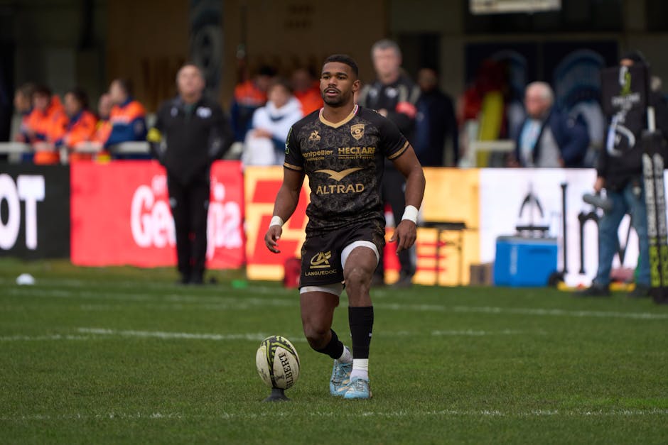 Professional rugby player on a field in Montpellier, Occitanie, France during a match.