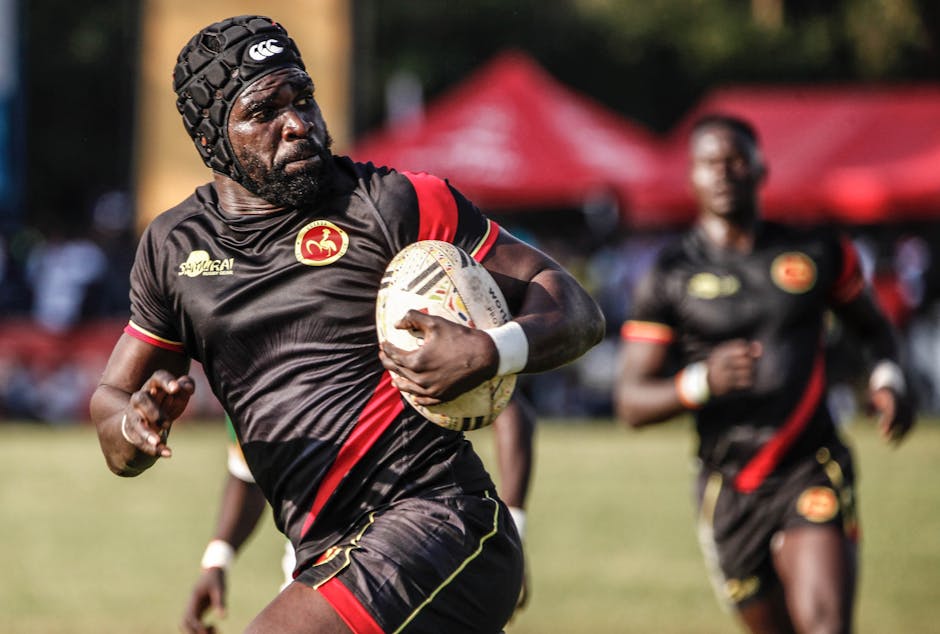 Rugby player in motion during an intense outdoor match.